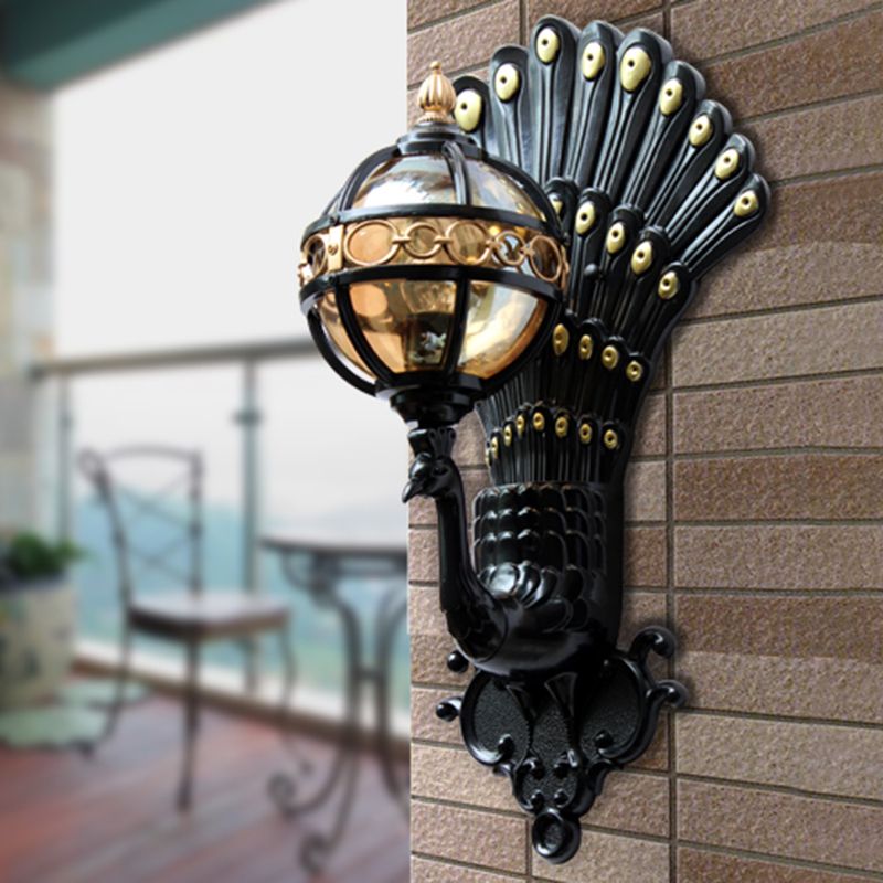 Amber Glass Ball Wall Lighting 1 Bulb Courtyard Wall Mounted Light in Black with Peacock Tail Backplate
