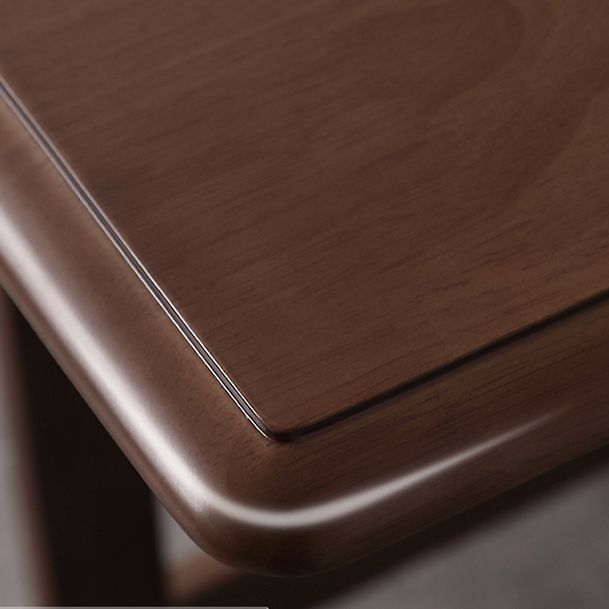 Mesa de comedor marrón moderna de mediados de siglo Mesa de comedor de hoja de madera maciza para uso en el hogar
