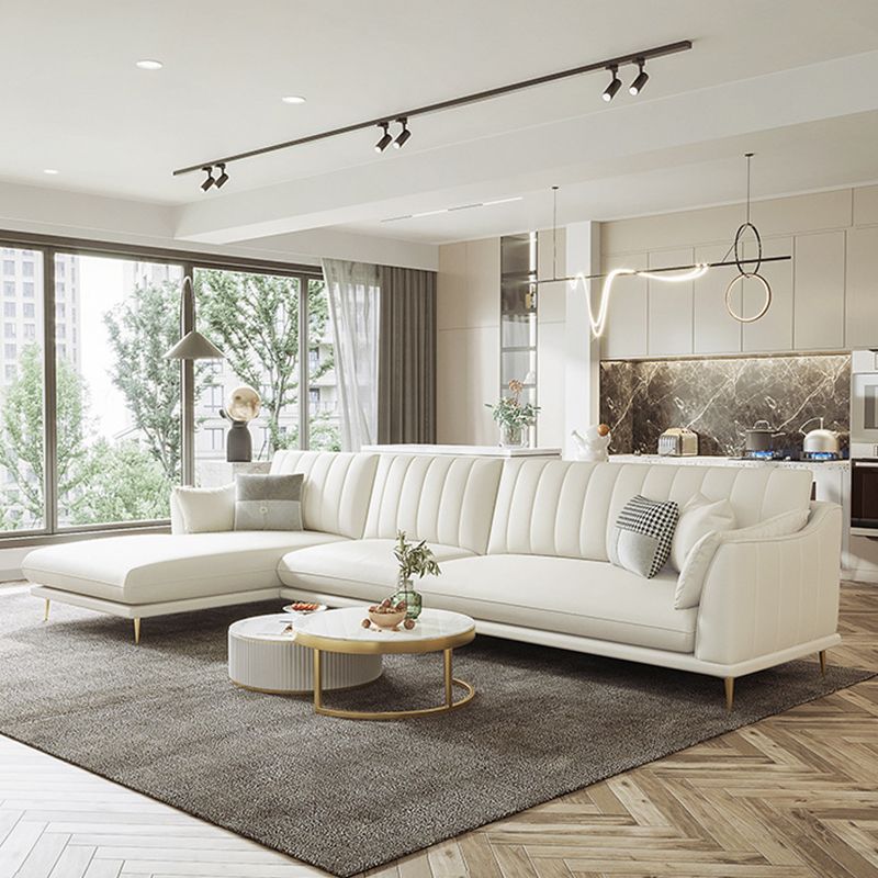 Sloped Arm Sofa with Chaise in White Sewn Pillow Back Faux Leather Sofa - 68.9" D