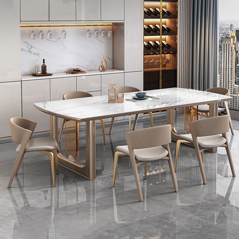 Mesa de comedor de lujo con tapa de piedra sinterizada, mesa rectangular con pedestal doble dorado
