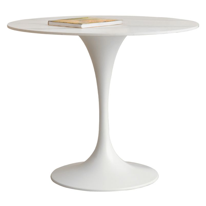 Eigentijdse eettafel van gesinterd steen met ronde vorm, keukeneettafel met tulponderstel