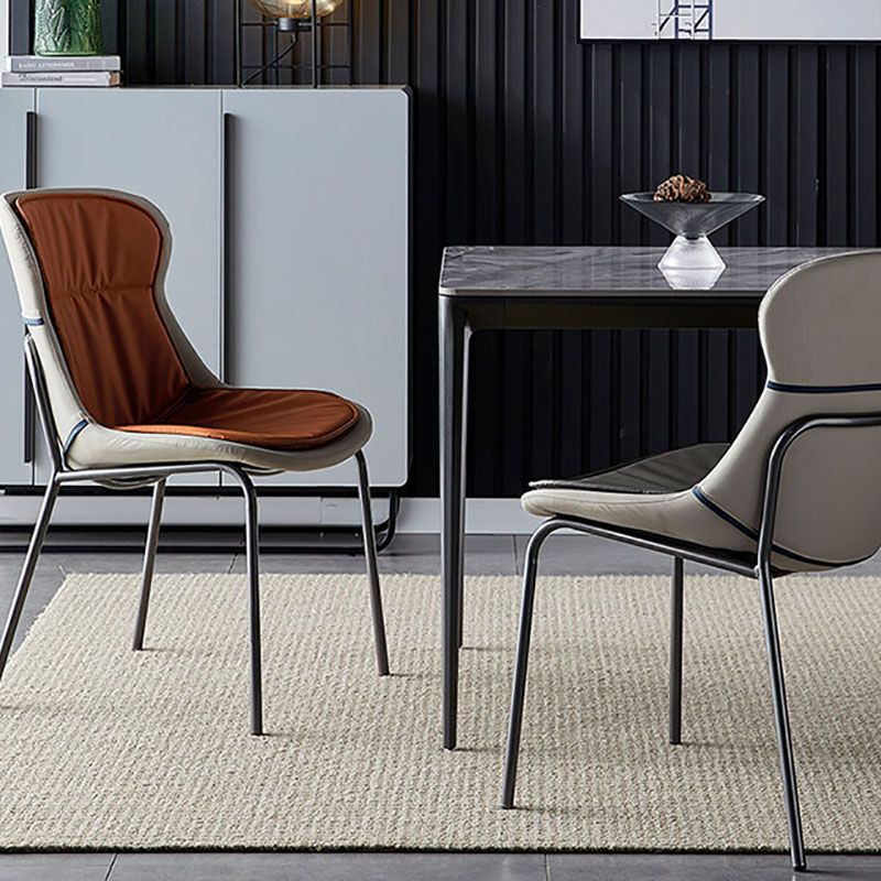 Sillas de comedor de cuero de estilo moderno, respaldo sólido sin brazos, silla lateral de comedor