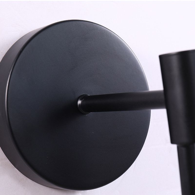 Luz de pared colgante de hierro forjado en una moderna lámpara de pared de vidrio de globo creativo para el dormitorio