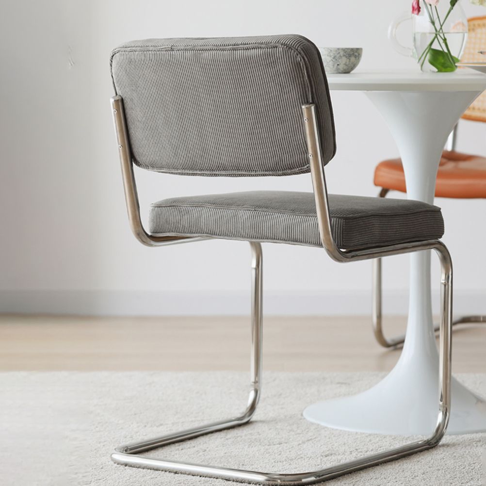 Eigentijdse metalen eetstoelen dineren open achterste armloze zijstoelen voor keuken