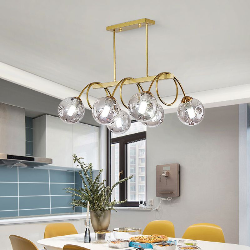 Gold Finish Spiral Island Light Post-Modern Metal Ceiling Hang Lamp with Ball Dimpled Glass Shade