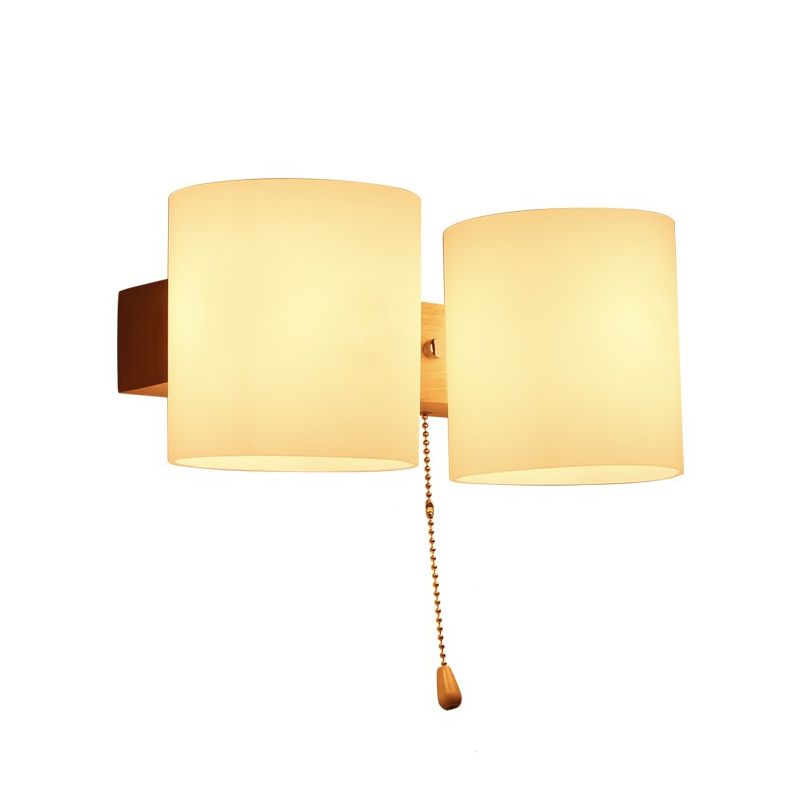 Application murale cylindroïde en bois dans la lampe murale en verre blanche de style concis moderne dans la couleur du journal