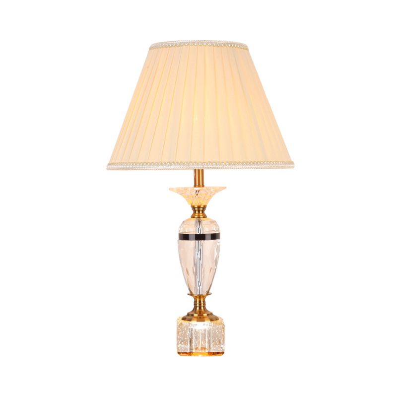 Distallo in tessuto in tessuto Urn Forma Light Modernist Crystal Faceted 1 lampada da tavolo notturno in bulbo in beige