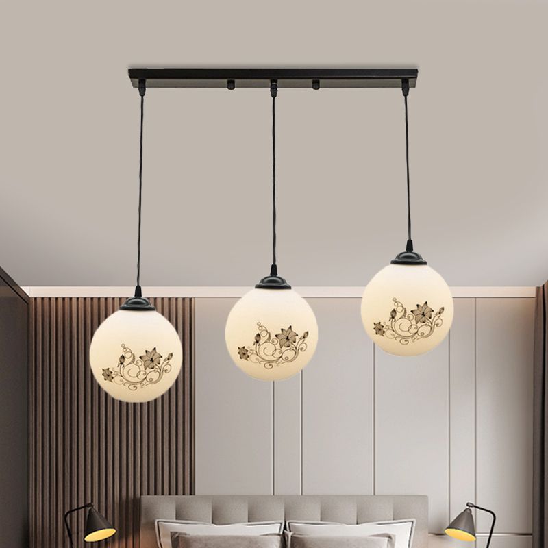 Black Sphere Multi Ceiling Lamp Modernism White Printing Glass 3-Light Dining Room Pendant with Round/Linear Canopy