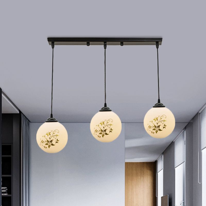 Black Sphere Multi Ceiling Lamp Modernism White Printing Glass 3-Light Dining Room Pendant with Round/Linear Canopy