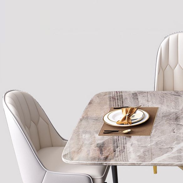 Mesa de comedor de piedra sinterizada de estilo moderno con mesa fija de altura estándar y base de caballete de oro