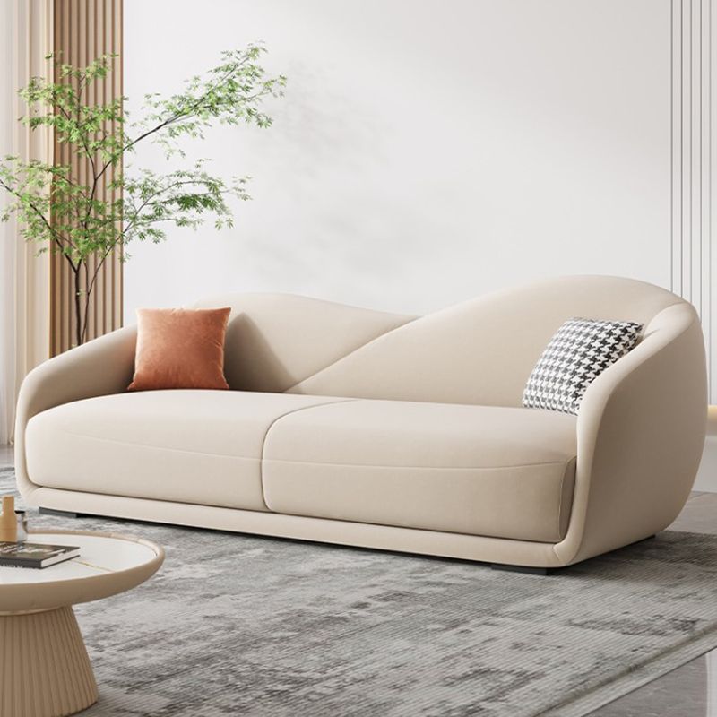 Contemporary Sloped Arm Curved Sofa Sewn Pillow Back Sofa for Living Room