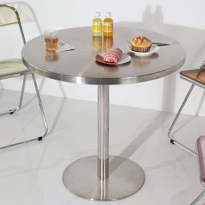 Mesa de comedor con astillas de metal Mesa de comedor de acero inoxidable con base de pedestal