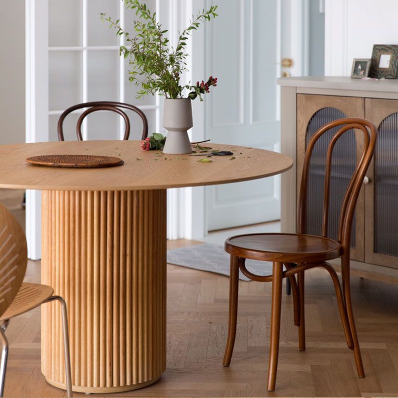 Mesa de comedor de madera sólida redonda colección de comedor estilo simplicidad con pedestal casual