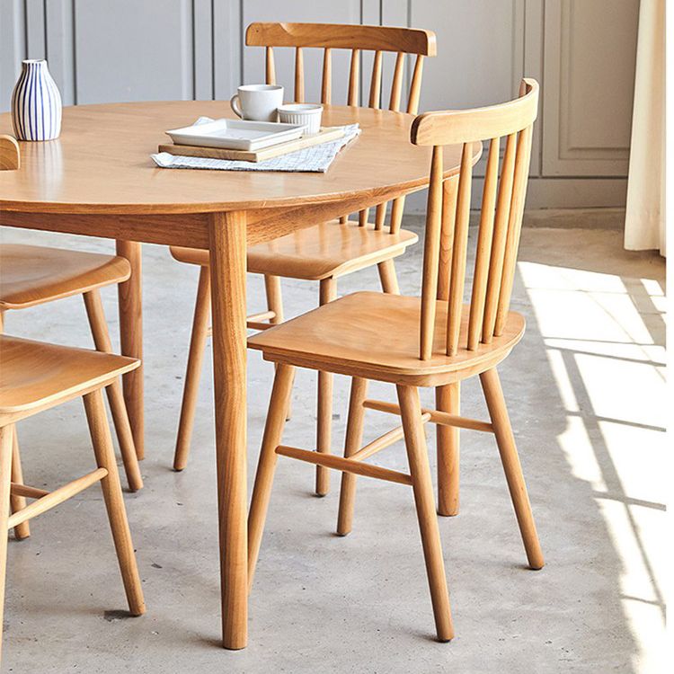 Round Dining Table Modern 4 Legs Wood Color Fixed Table of Solid Wood