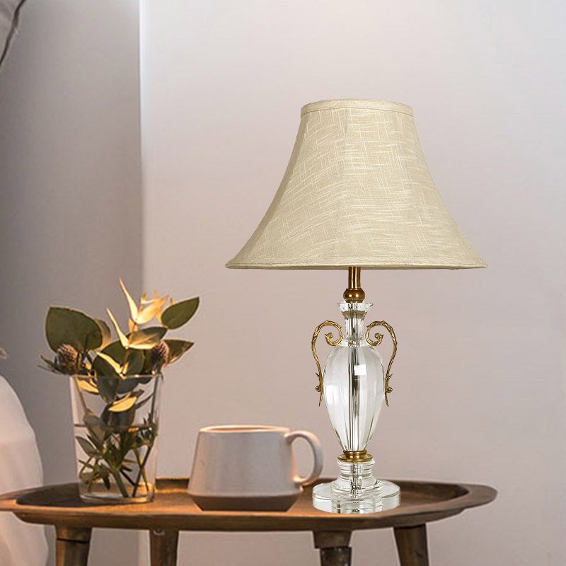 La lampe de table de nuit de nuits de cloche en pierre claire 1 bulbe contemporain avec ombre en tissu