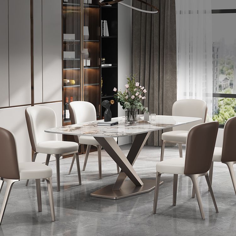 Mesa de comedor de piedra sinterizada de estilo contemporáneo con mesa fija blanca y base de caballete para uso en el hogar