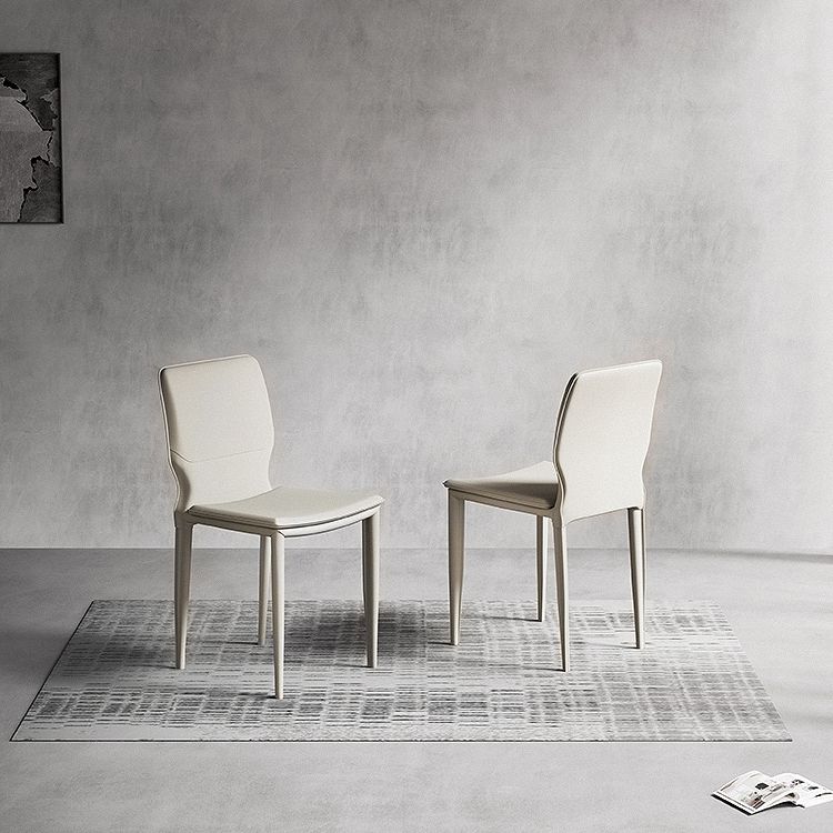 Sillas laterales contemporáneas sin brazos con respaldo sólido Sillas de comedor de cuero