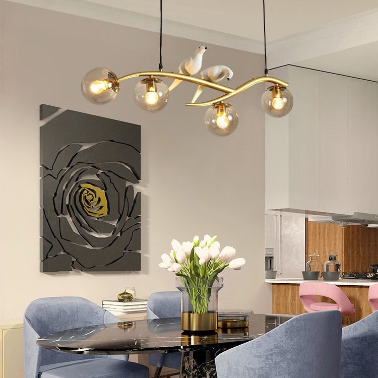 Glass Globe Island Light in Modern Singularity Wrought Iron Pendant Light with Resin Bird Decoration