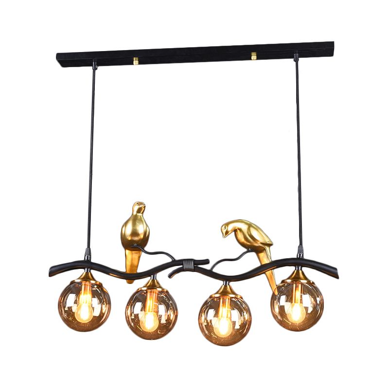 Sprig Island Pendant Light Postmodern Iron 4-Light Black/Gold Hanging Lamp with Amber Ball Glass Shade and Bird Deco