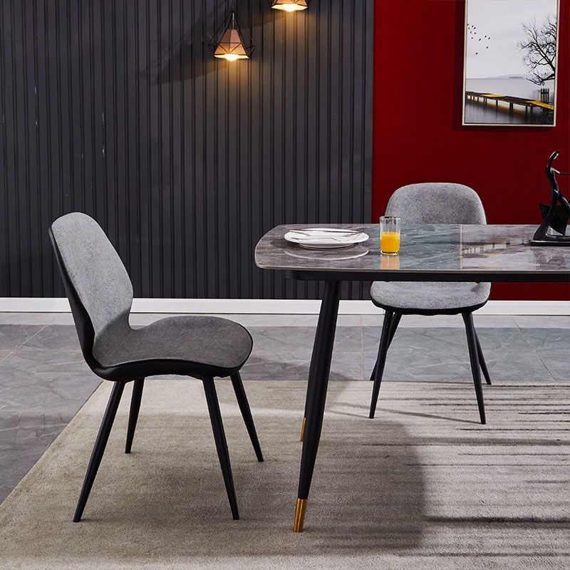 La parte posterior sólida sin brazos del diseño minimalista preside el cuero de la microfibra que cena la silla lateral