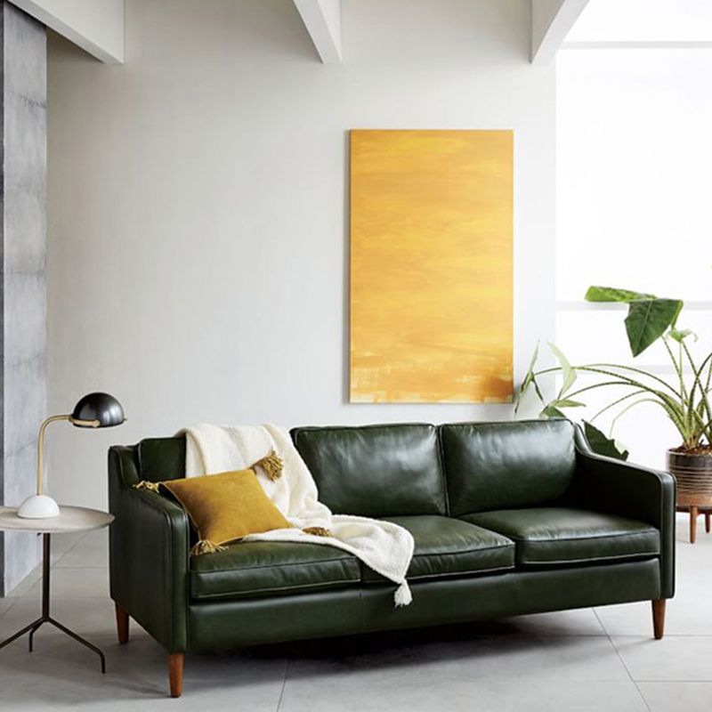 Industrial Faux Leather Loose Back Sofa with Solid Color Sloped Arms
