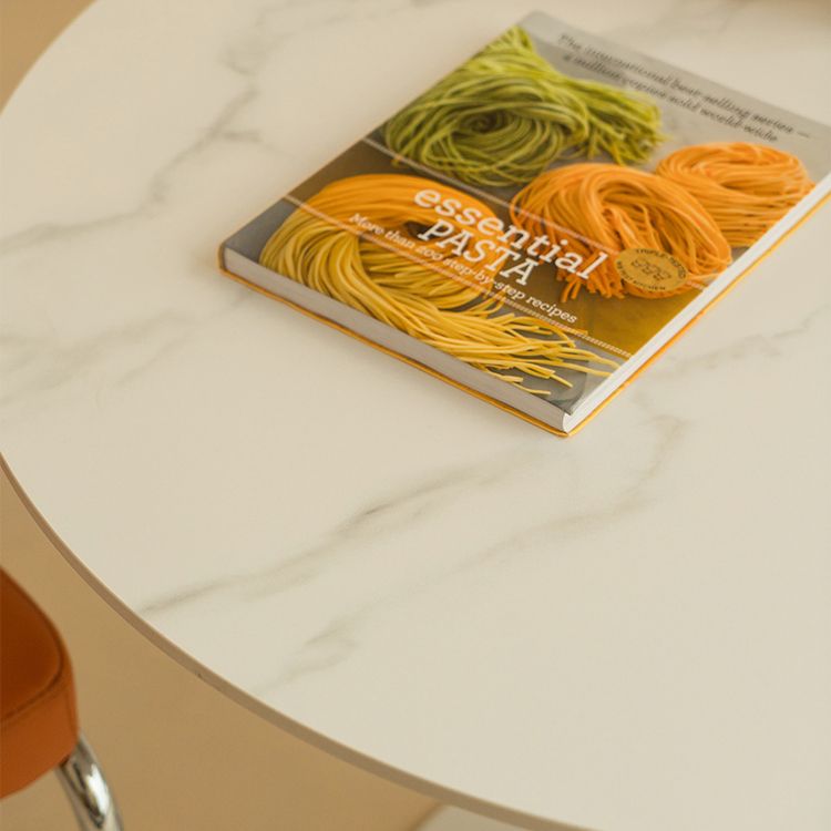 Eigentijdse eettafel van gesinterd steen met ronde vorm, keukeneettafel met tulponderstel