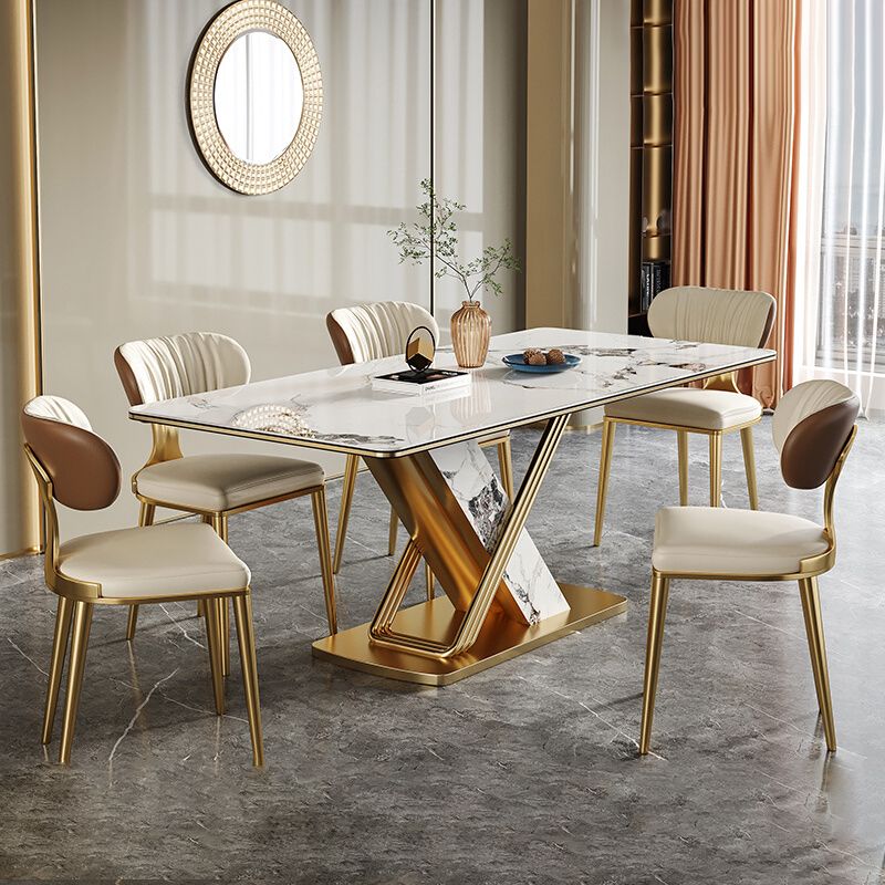 Mesa de comedor de piedra sinterizada de estilo moderno con mesa fija blanca y base de caballete para uso en el hogar