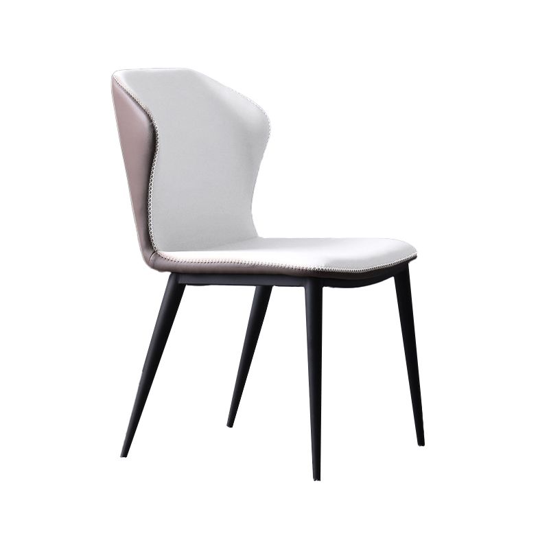 Sillas Wingback Parsons de estilo industrial Sillas de comedor de cuero sin brazos (juego de 2)