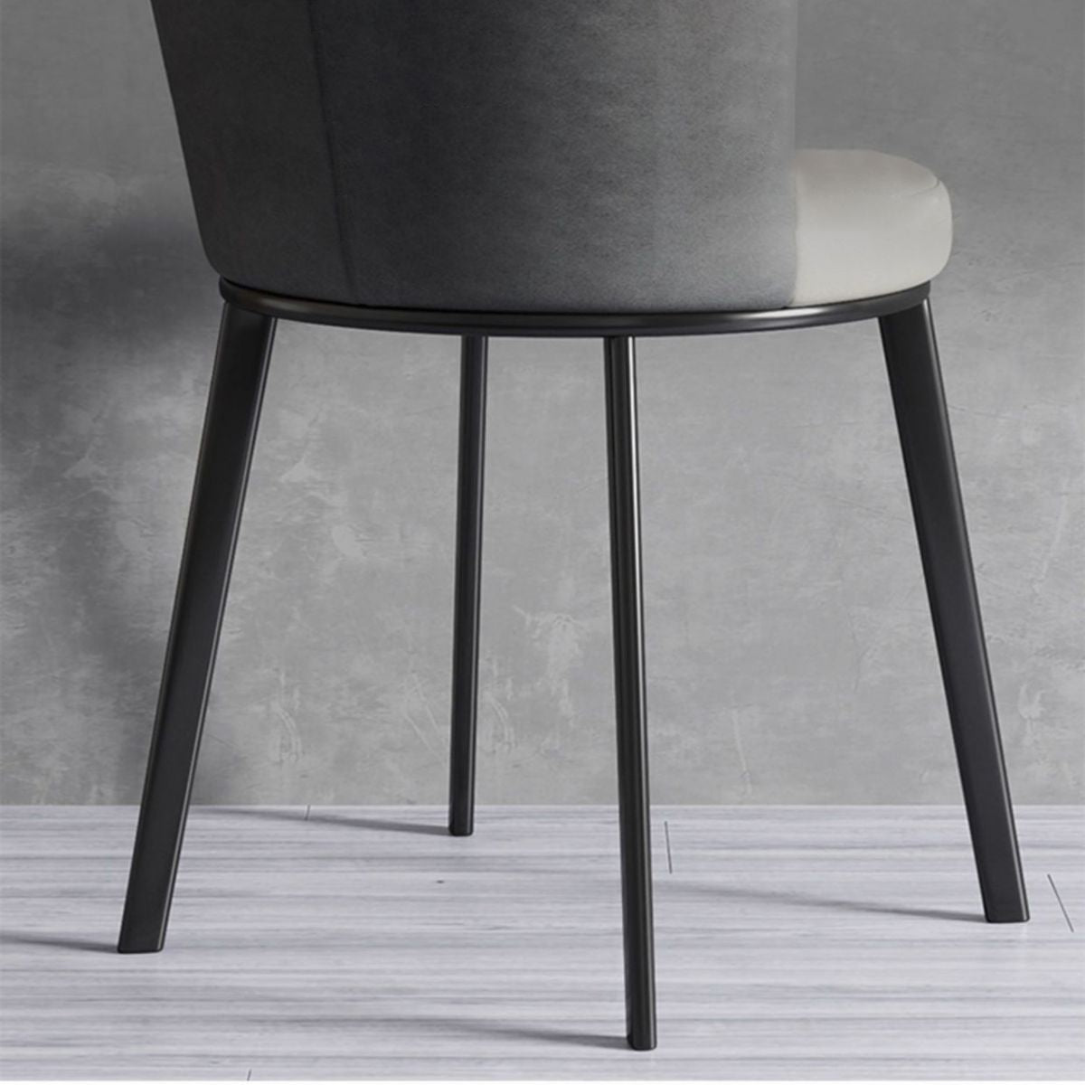 El lado contemporáneo del comedor preside la silla curvada de cuero mate de Parsons