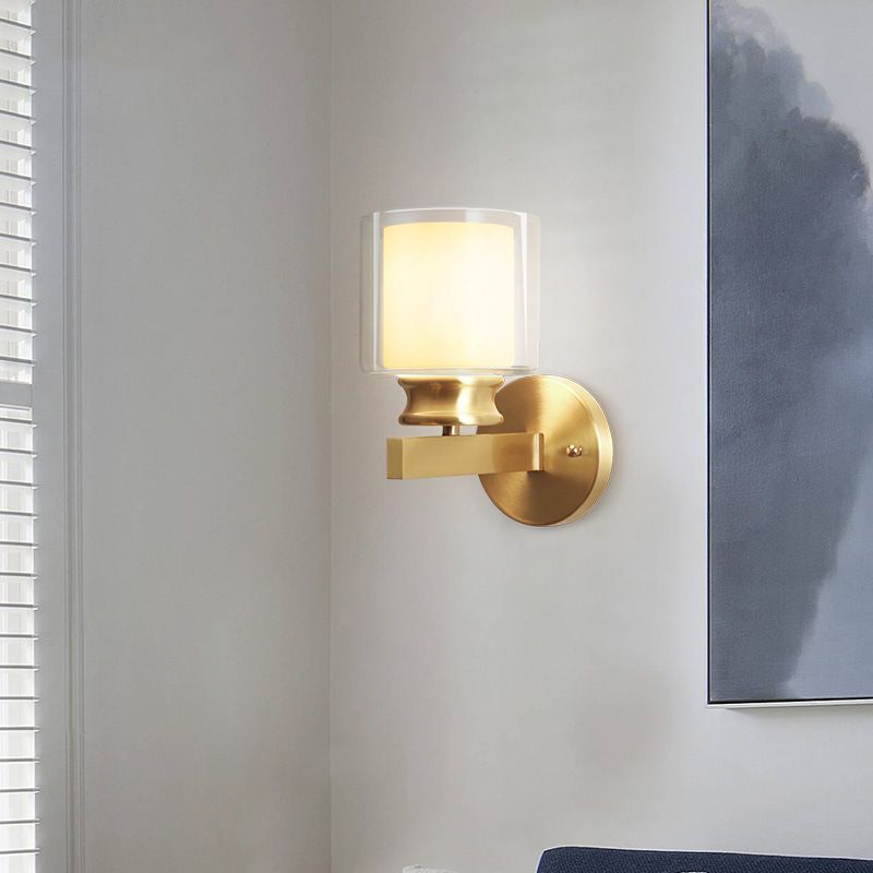 Modern Style Cylindrical Wall Sconce 1 Light Clear and White Glass Wall Mount Lamp in Brass for Bedroom