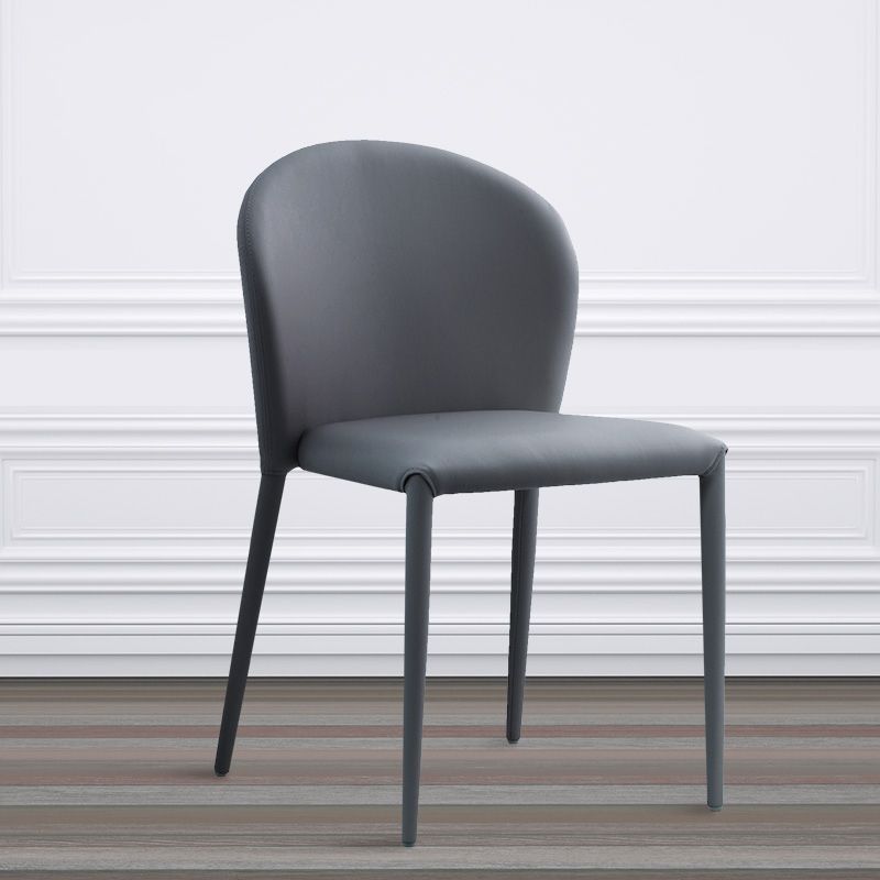 Minimalistische stijl armloze vaste achterzijde stoelen lederen eetkamerstoelen voor thuis
