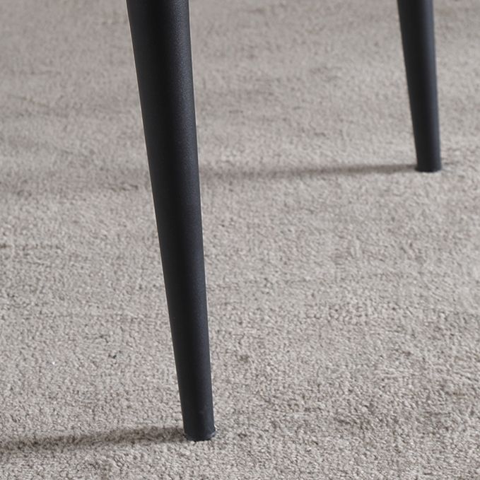 El lado sin brazos del diseño contemporáneo preside el cuero que cena la silla lateral