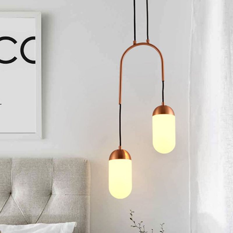Post Modern Capsule Multi Ceiling Light White Glass 2 Lights Bedside Arced Pendant Lamp in Copper