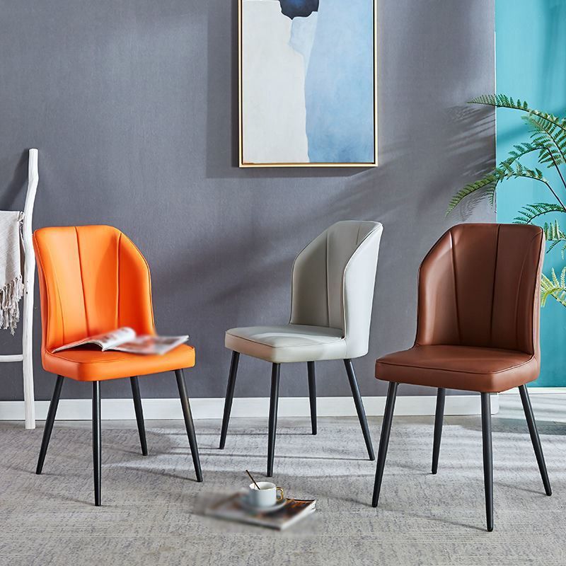 Silla contemporánea del comedor del metal Silla sin brazos Wingback para el uso del restaurante