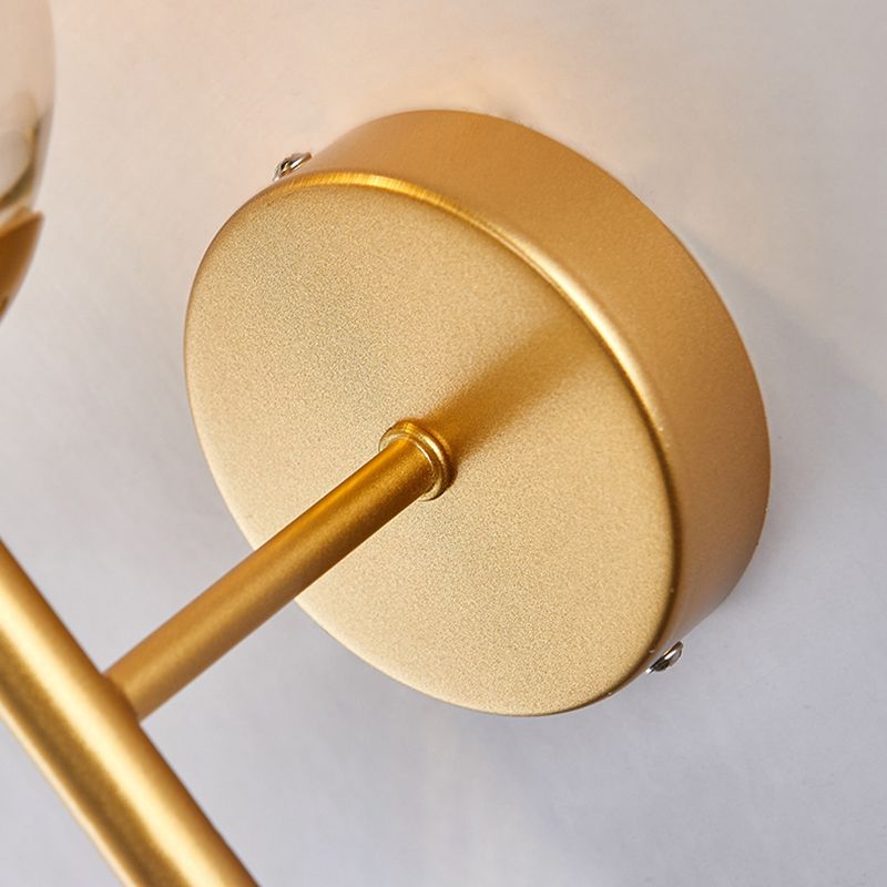 Wrought Iron Wall Lamp in Modern Luxury Style Globe Glass Wall Sconce for Interior Spaces