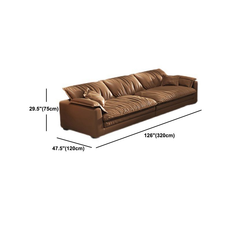 Glam Style Sofa Bed with Sponge Upholstery Filled Orange Faux Leather Sofa