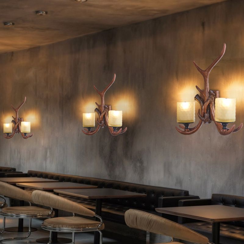 Deer Horn Resin Wall Light Vintage Restaurant Wall Mounted Lamp with Cylinder Beige Glass Shade in Brown