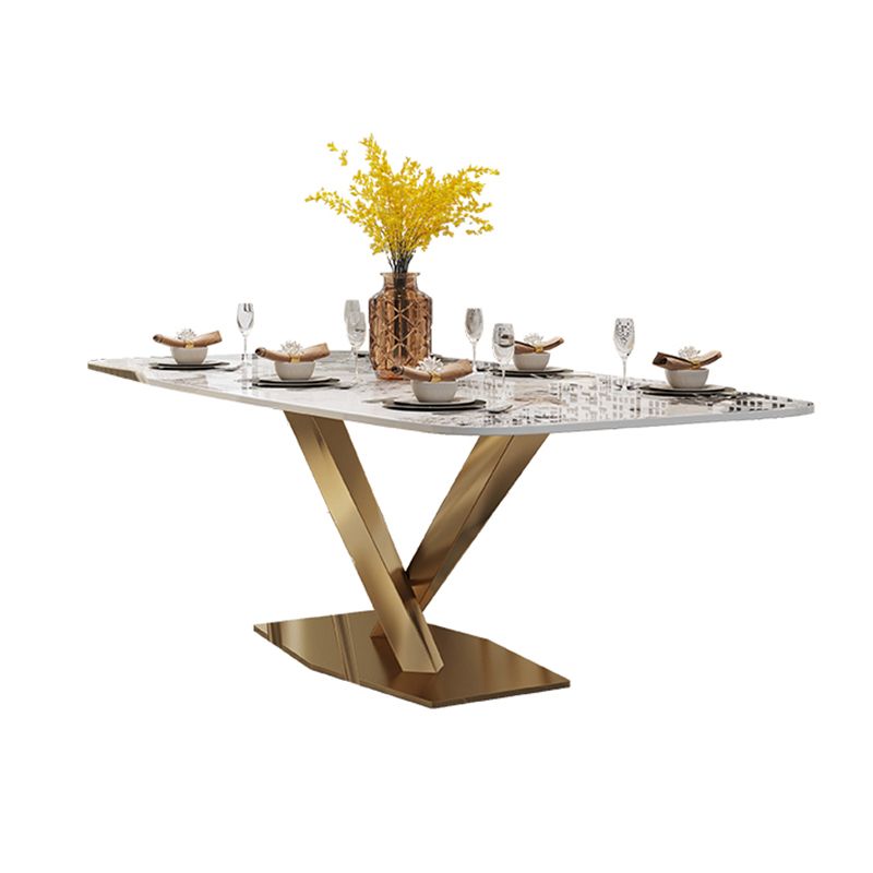 Mesa de comedor rectangular de lujo tradicional de metal, mesa superior de piedra sinterizada con base de pedestal