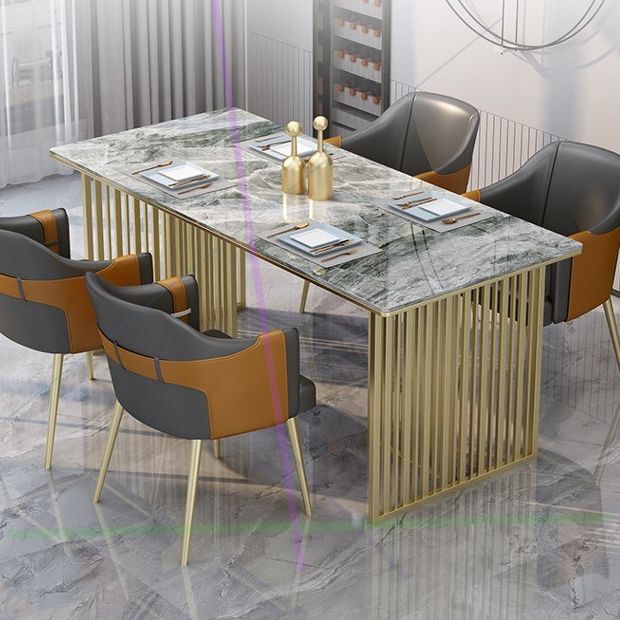 Mesa de comedor rectangular de piedra sinterizada Mesa de comedor de lujo tradicional con marco dorado