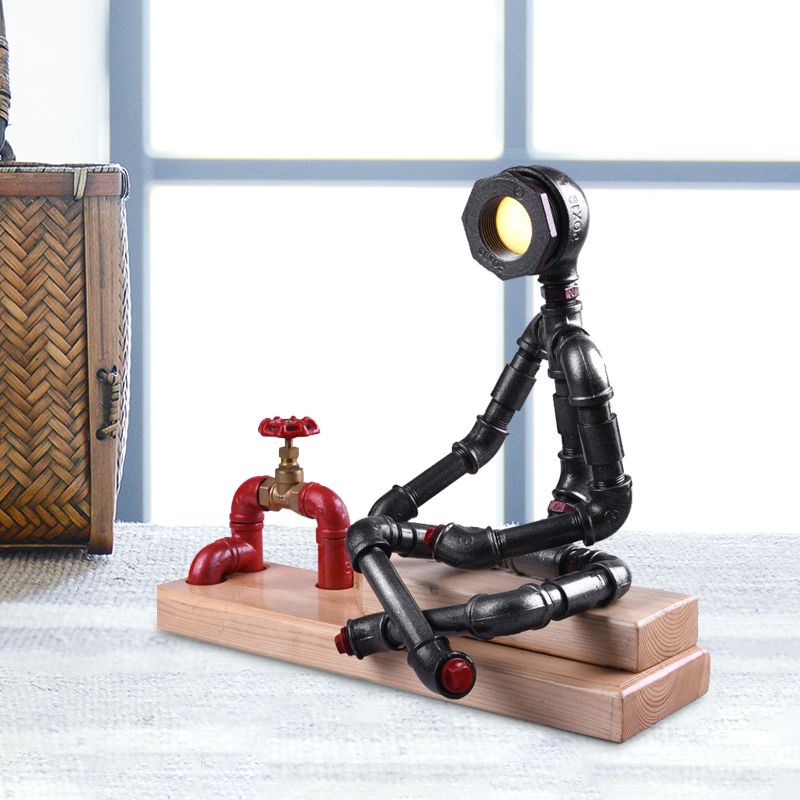 Lámpara de mesa LED Industrial con patas cruzadas de hierro para dormitorio, lámpara de noche en negro con válvula decorativa y base de madera rectangular