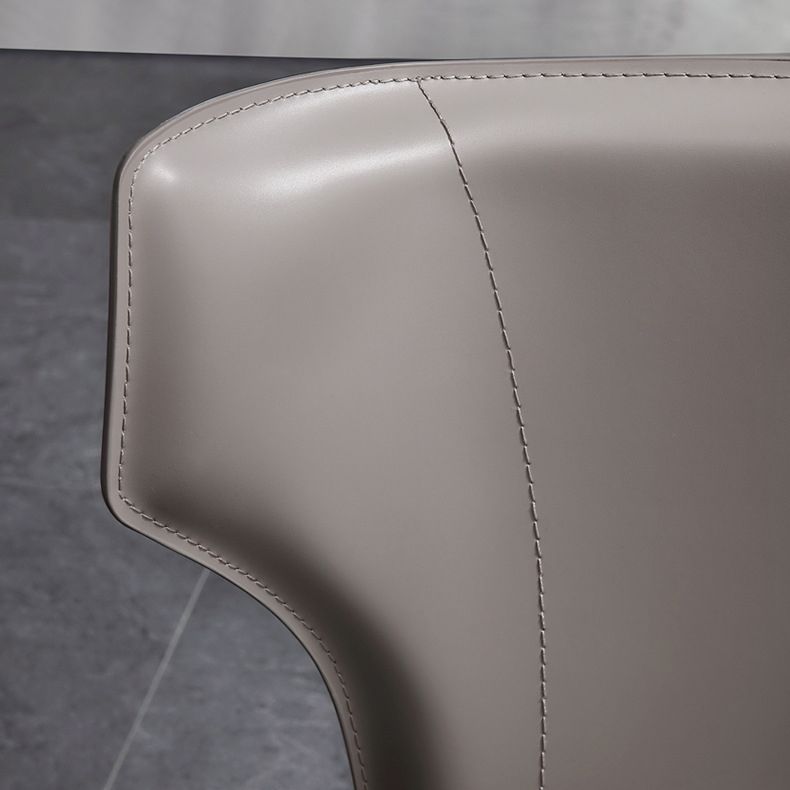 Moderner Wingback Side Stuhl Leder armlosen Essstuhl mit Metallbeinen
