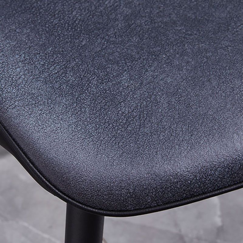 La parte posterior sólida sin brazos del diseño minimalista preside el cuero de la microfibra que cena la silla lateral