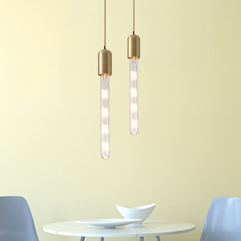 Gold Slim Dropserve Pendant Postmodern 1 Bulb Lampada in vetro trasparente sul tavolo da pranzo