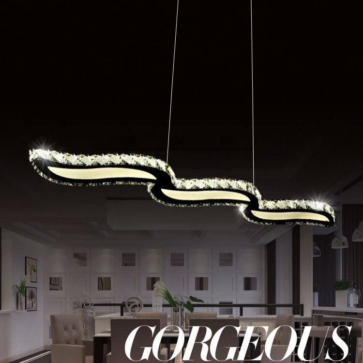 Moderno lussuoso lussuoso isola a pendente illuminazione ondata prismatica a soffitto di cristallo ottico per soggiorno