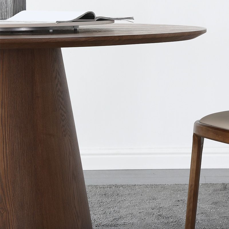 Pedestal Base Is Designed for a Round Coffee Table Made of Walnut Wood
