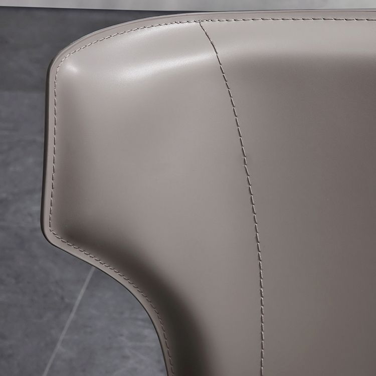 Silla lateral de comedor de cuero de estilo diseñador Silla de comedor Wingback para uso doméstico