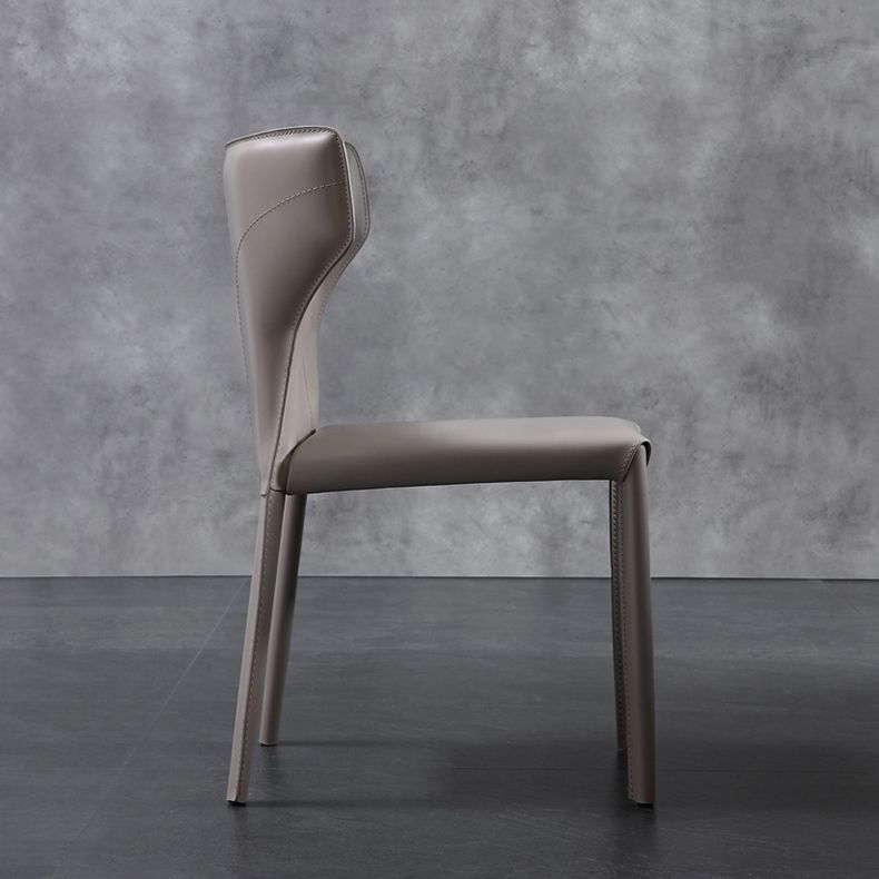 Moderner Wingback Side Stuhl Leder armlosen Essstuhl mit Metallbeinen