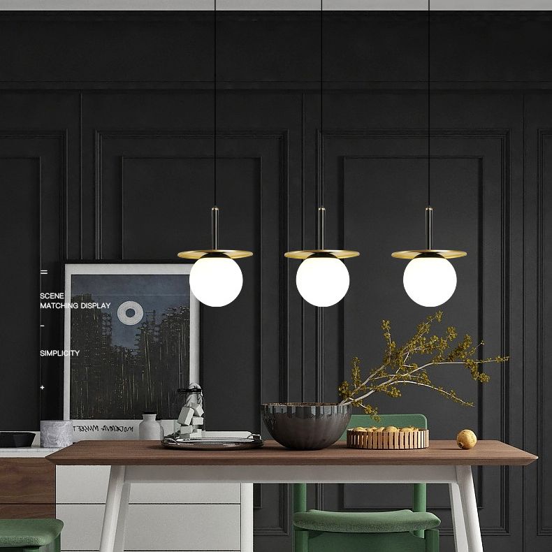 7" Wide White Glass Globe Mini Hanging Light with Round Metal Sheet Decoration Post-modern Style Simplicity Lighting Pendant in Gold