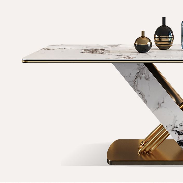 Mesa de comedor de piedra sinterizada de estilo moderno con mesa fija blanca y base de caballete para uso en el hogar