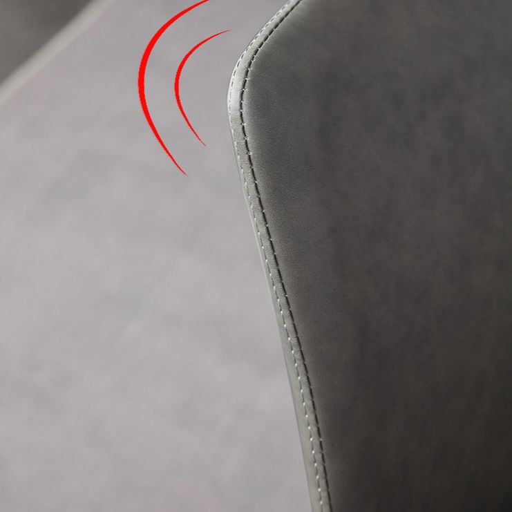 Sillas de comedor sin brazos tapizadas Sillas laterales con respaldo sólido de cuero con patas de metal